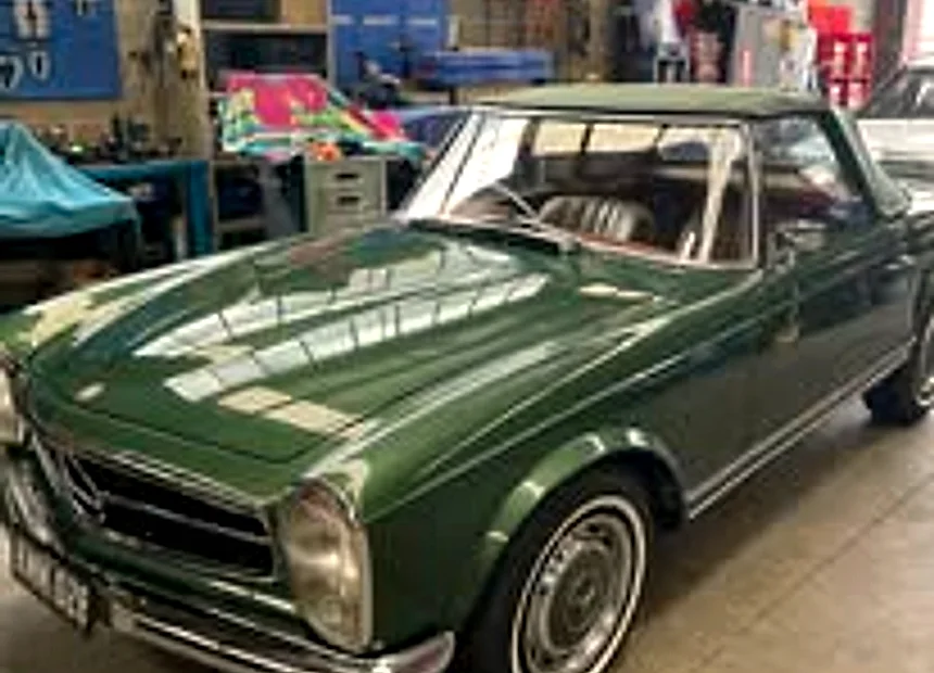 A classic Mercedes-Benz Pagoda on the bench at Atelier Automotive
