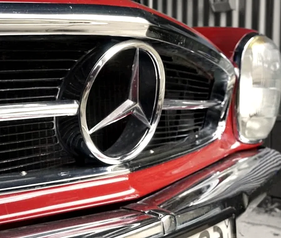 Close detail of a classic Mercedes-Benz grille and badge